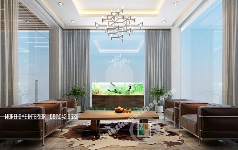 Mẫu thiết kế phòng tiếp khách tại sảnh lớn công ty VCC sang trọng, đẳng cấp với đồ nội thất cao cấp như: sofa da nhập khẩu, bàn gỗ tự nhiên, đèn trang trí,.. Xem ngay các mẫu thiết kế phòng khách đẹp đa phong cách