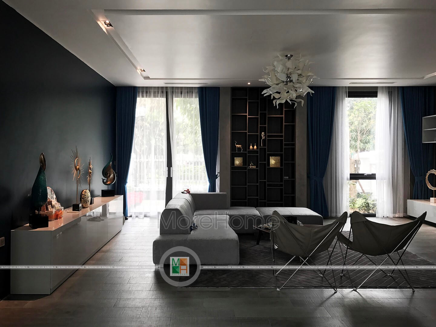 Lắp đặt sofa vào trung tâm không gian phòng khách giúp kết nối toàn bộ diện tích Thiết kế phòng khách