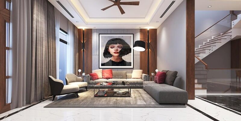 Trang trí nội thất phòng khách ấn tượng với phong cách hiện đại cùng cách trang trí sáng tạo từ điểm nhấn tranh treo tường nghệ thuật. Thiết kế chung cư