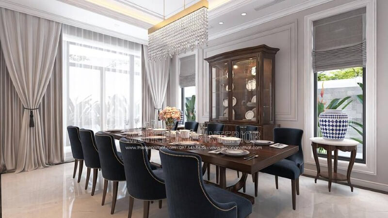Trang trí nội thất phòng ăn phòng ăn tân cổ điển đẹp, quý phái với không gian bàn ăn dành cho 10 người nhưng vẫn rộng rãi thông thoáng. Thiết kế phòng ăn biệt thự