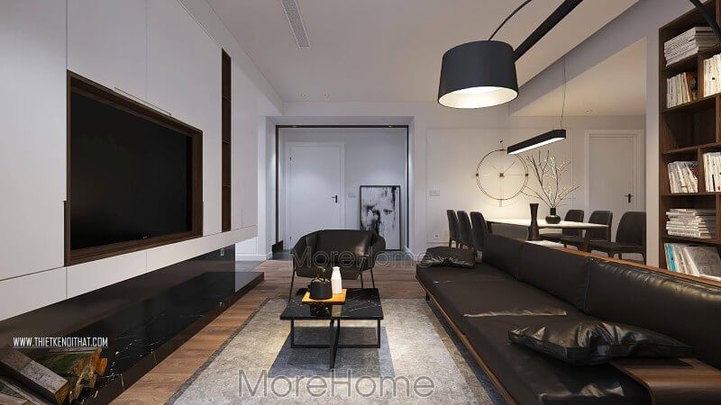 Điểm nhấn của phòng khách này là bộ sofa da gỗ màu đen cao cấp tạo điểm nổi bật giữa căn phòng với tông màu trắng làm chủ đạo