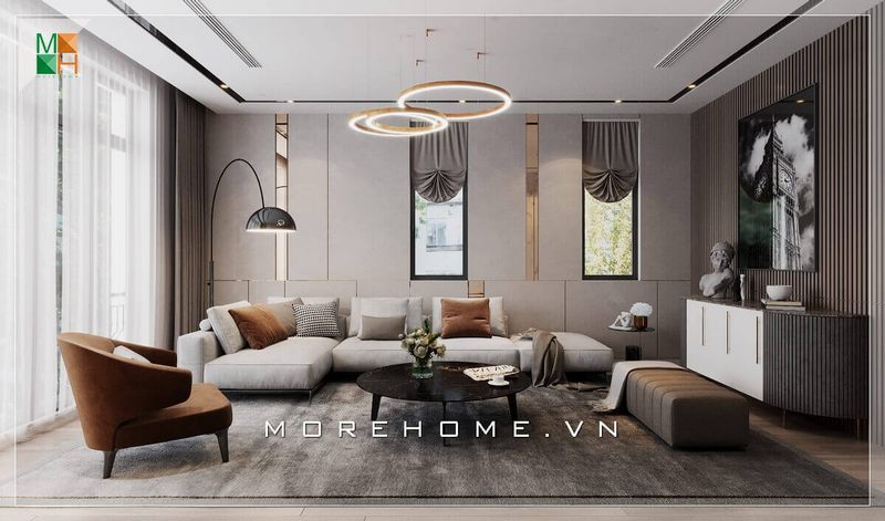 Bộ sofa phòng khách gồm một ghế chữ L và một ghế đơn bằng gỗ tự nhiên bọc nỉ cao cấp, mang sự trẻ trung, hiện đại cho căn phòng